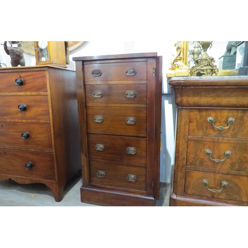 7770 - A Victorian walnut five drawer Wellington chest (the locking bar with key) over a plinth base, 107cm... 