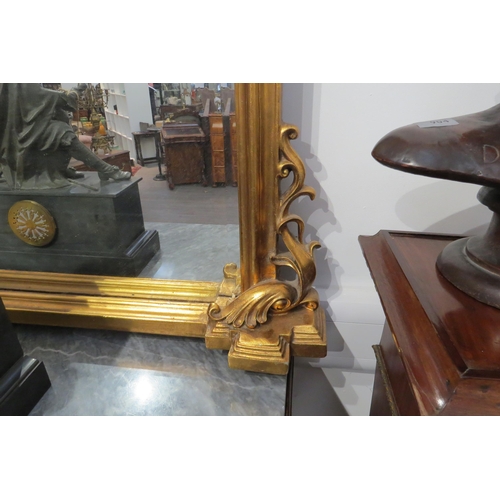 7771 - A 19th Century gilt overmantel mirror of domed form with acanthus embellishment, 137cm x 135cm