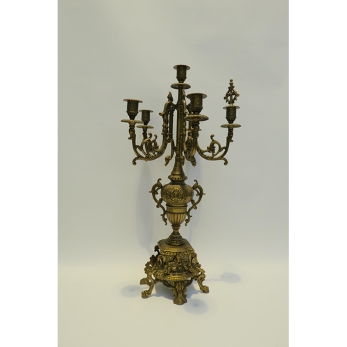 7772 - A pair of ormolu six sconce candelabra, scrolled detail, 60cm high