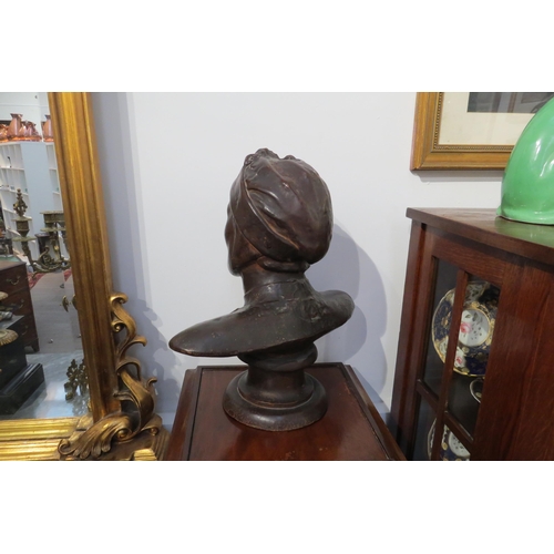 7775 - A terracotta bust of Dante with bronzed effect, 42cm tall