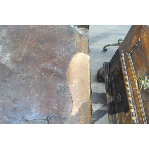 7783 - A late 17th/early 18th Century Spanish walnut chair with leather back and seat (repairs and distress... 