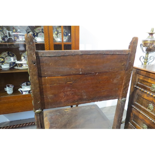 7783 - A late 17th/early 18th Century Spanish walnut chair with leather back and seat (repairs and distress... 