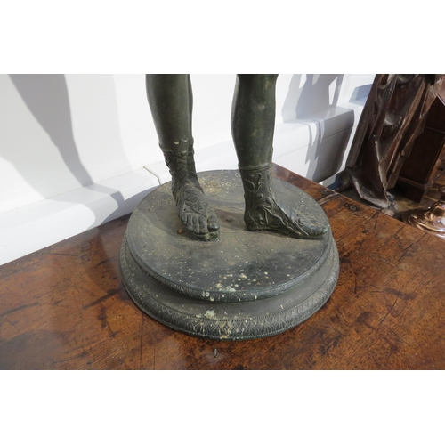 7787 - A cast metal sculpture of Dionysus / Narcissus standing 62cm high, verdigris effect