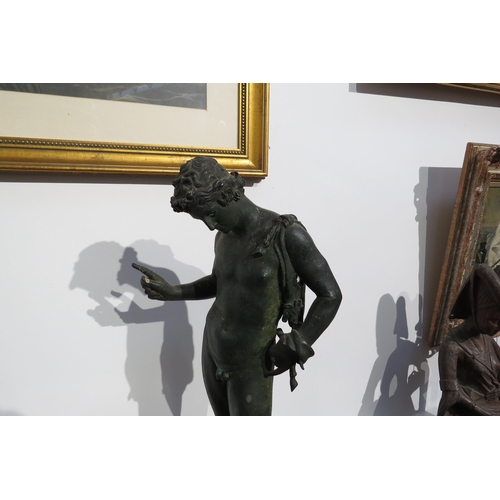 7787 - A cast metal sculpture of Dionysus / Narcissus standing 62cm high, verdigris effect