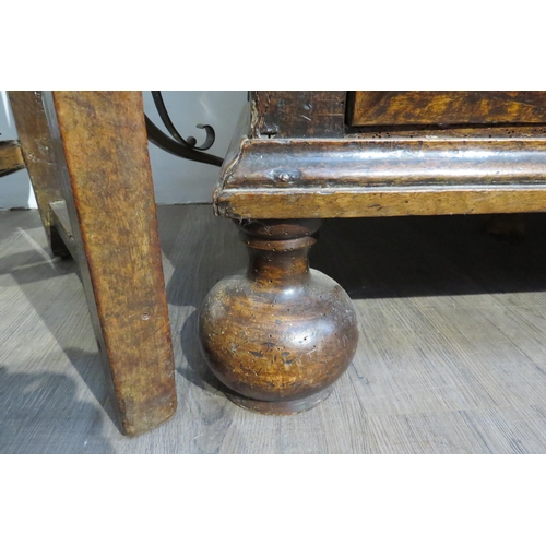 7788 - A 17th Century walnut chest of four long graduating drawers, later added beaded detail, on heavy bun... 