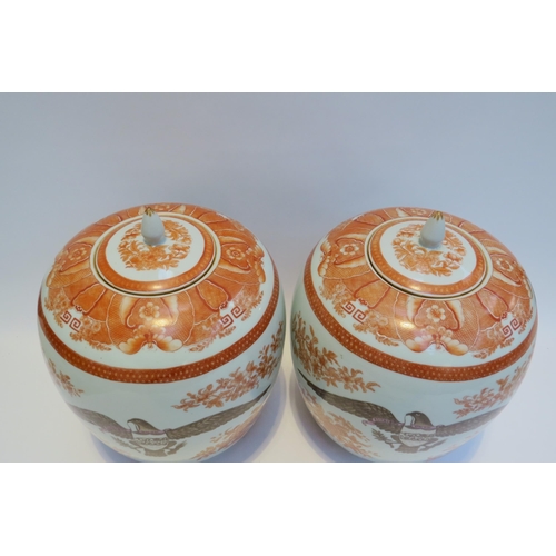 7797 - A pair of large ceramic lidded pots / containers with eagle armorial crests, floral detail, 34cm tal... 