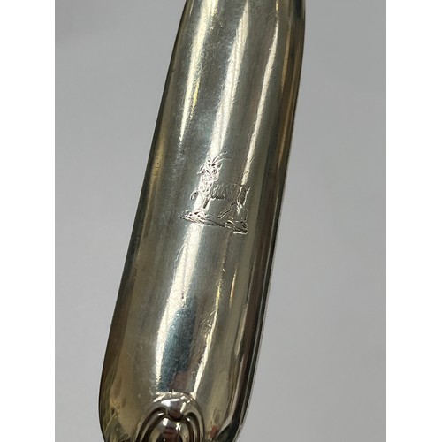 7269 - A William IV silver marrow scoop, maker's mark W.C., with goat design emblem, London 1832, 65g