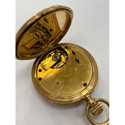 7277 - An 18ct gold Royal Waltham Mass. fob watch with white face, Roman numerals in a highly decorative ca... 