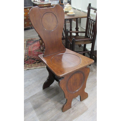 7124 - A 19th Century mahogany hall chair with sphere panel detail, 98cm x 44cm x 48cm            (E) £30-5... 