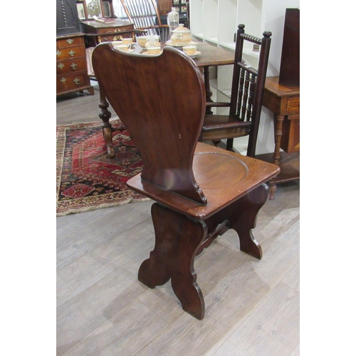 7124 - A 19th Century mahogany hall chair with sphere panel detail, 98cm x 44cm x 48cm            (E) £30-5... 