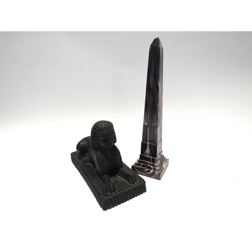 7126 - A Victorian slag glass obelisk, 28cm tall and Victorian moulded glass Sphinx with lozenge mark to ba... 