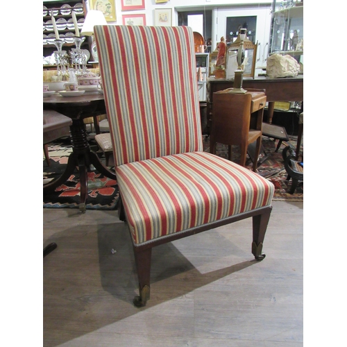 7132 - WITHDRAWN: A Victorian open armchair with high back upholstered in stripe material with leaf form cu... 