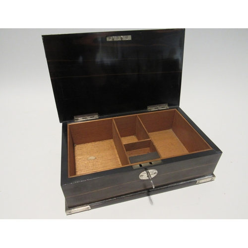 7135 - An Edwardian coromandel humidor/cigar box with M Chapman Son & Co Ltd silver mounts, lockable with k... 