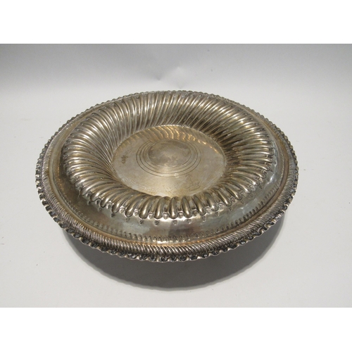 7148 - WITHDRAWN: London Assay office stamped foreign silver embossed charger/alms dish with family crest d... 