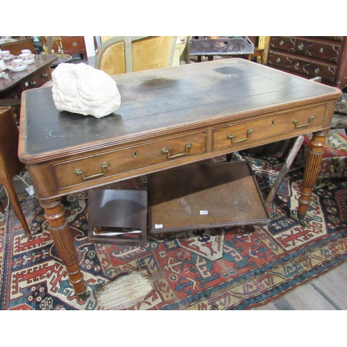 7150 - A George III library desk with inset tooled leather top with Greek key border.  Reeded edge over two... 