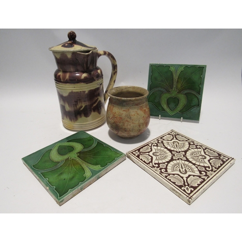 7156 - A 19th Century striped Provence pottery lidded jug, small pot and three tiles (5) 24cm and 11cm tall