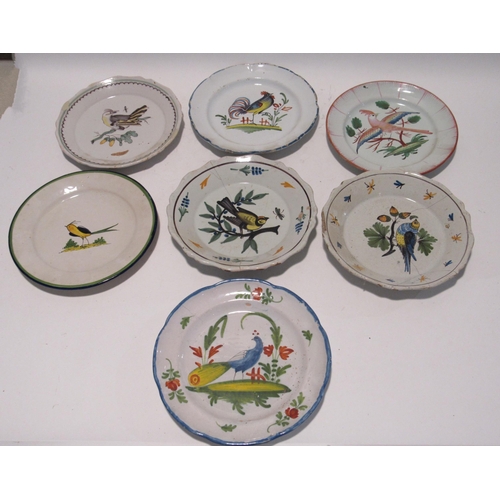 7178 - Seven late 18th/19th Century French Faience plates with bird decoration.  Two with staple repairs, a... 