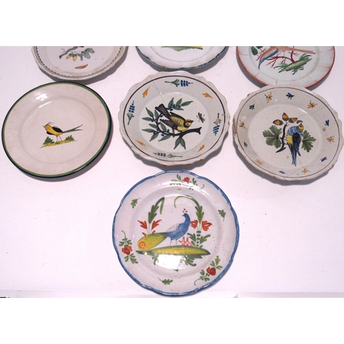 7178 - Seven late 18th/19th Century French Faience plates with bird decoration.  Two with staple repairs, a... 