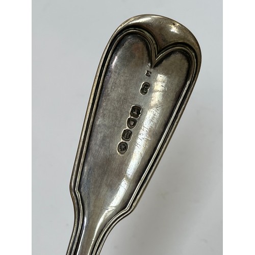 7304 - A Chawner & Co (George William Adams) silver soup ladle, reeded detail, emblem of arm holding a dagg... 