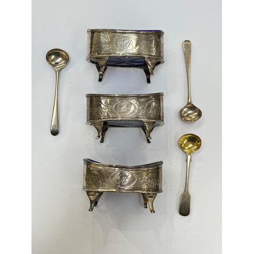 7308 - Three Charles Chesterman II silver table salts, chased foliate engraved with dragon and crown emblem... 