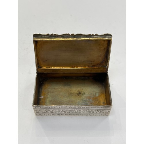 7310 - A George III Scottish silver snuff box, allover chased scrolled foliate detail, gilded interior, Edi... 