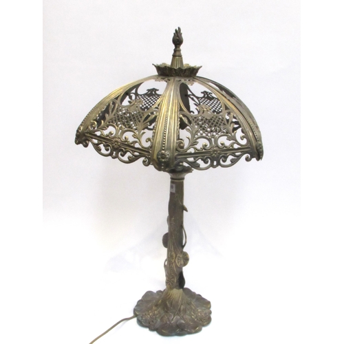 7806A - A circa 1975 embossed brass table lamp with lily pattern a/f   (R) £50 FIRM