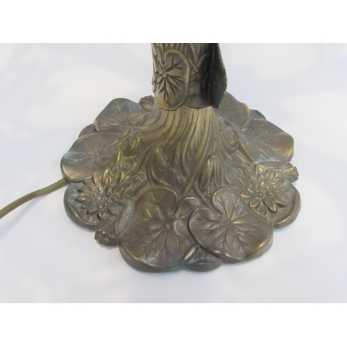 7806A - A circa 1975 embossed brass table lamp with lily pattern a/f   (R) £50 FIRM