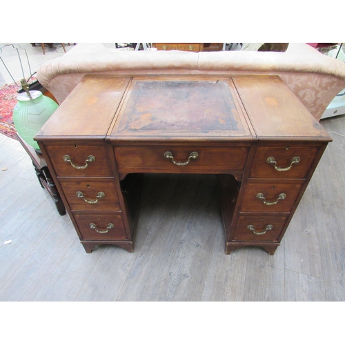 7815 - A 19th Century mahogany twin pedestal desk by S&H Jewell of Holborn, shell marquetry inlay and satin... 