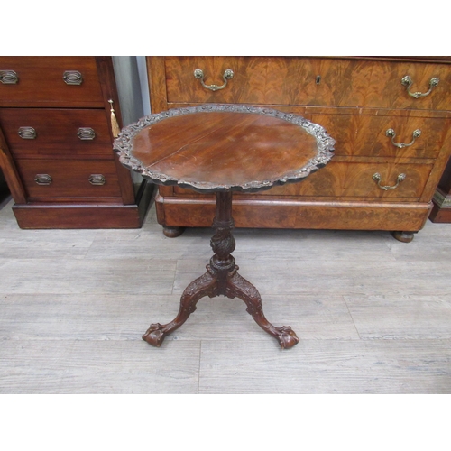 7820 - A pie crust table with elaborate carved decoration on claw and ball feet, (top a/f), 64cm tall, 51cm... 