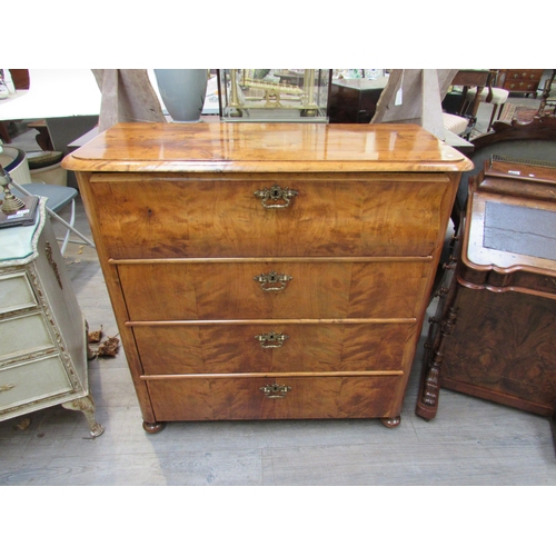 7829 - A Victorian Swedish Biedermeier golden birch chest of four long drawers with decorative brass handle... 