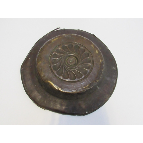 7832 - A 17th Century brass alms dish, some damage present, 39.5cm diameter