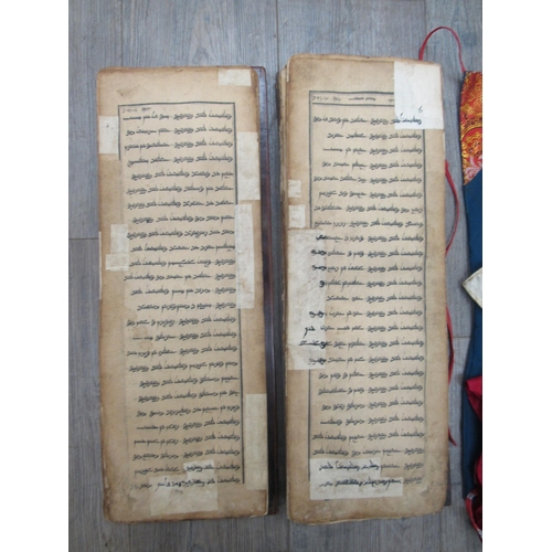 7839 - A 19th Century hardwood bound quantity of Arabic script, thought to be religious, together with othe... 