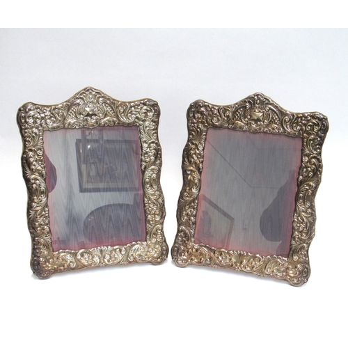 7842A - A pair of Sheffield silver plate easel back photograph frames, foliate scrolled design, overall 38cm... 