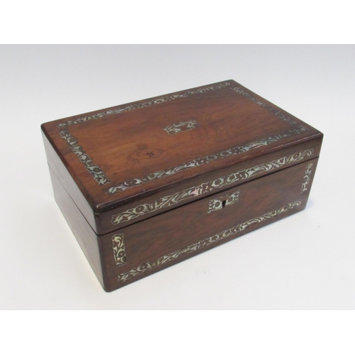 7844 - A Victorian rosewood writing box, mother-of-pearl foliate and floral borders and escutcheon, fitted ... 