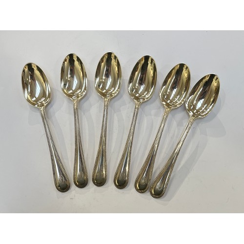 7320 - A set of six W. Jenkins silver teaspoons, beaded border, monogrammed handles, Glasgow 1872, 125g