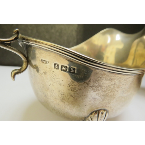 7374 - A pair of E.S Barnsley & Co. silver sauce boats, Birmingham 1911, monogrammed 