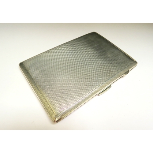 7379 - An Edwardian Joseph Houlston silver cigarette case, engine turned detail, Birmingham 1945, 205g