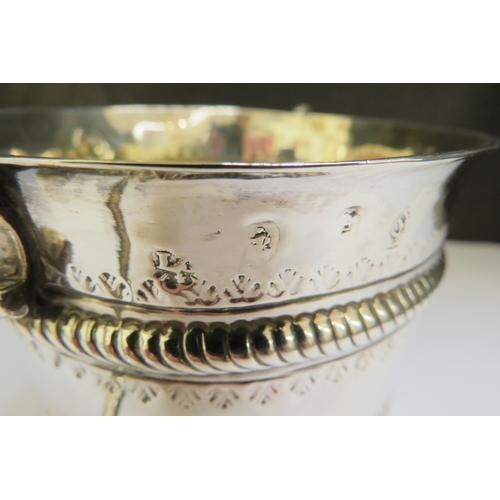 7385 - A silver Queen Anne porringer, London 1713, possibly Nathaniel Locke, 16.5cm diameter to handles, 9.... 