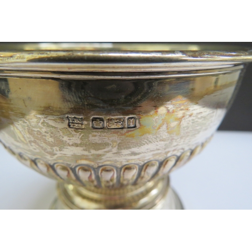 7387 - A Fenton Brothers Ltd silver fluted pedestal bowl, Sheffield 1903, 7.5cm tall, 115g on associated we... 