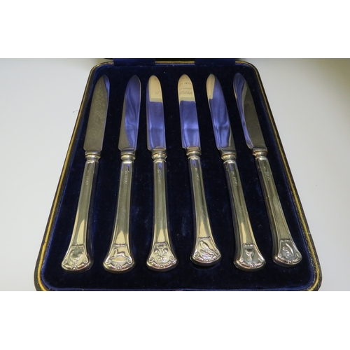 7397 - A set of silver handled tea knives each with a different animal motif to handle, Sheffield 1922