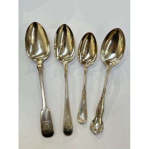 7333 - Three silver serving spoons together with a silver dessert spoon. Various makers and dates, 285g