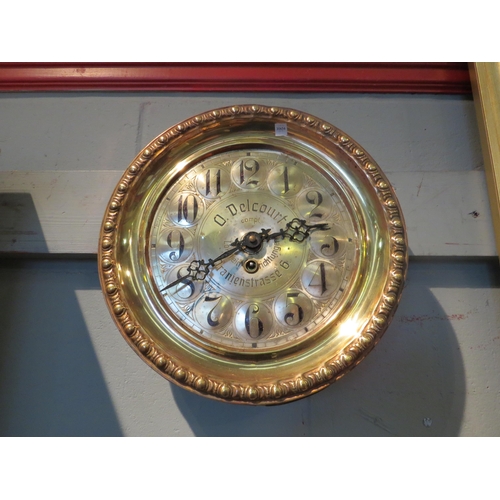 1089 - A German wall timepiece advertising O. Delcourt, Oranienstrasse 6, copper and brass circular case, 8... 