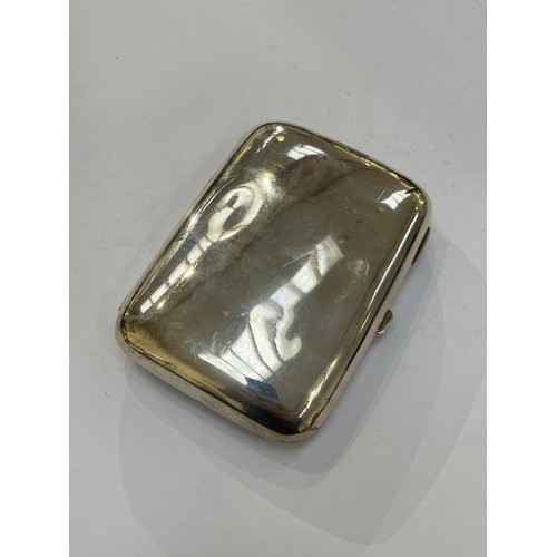 7336 - A Joseph Gloster silver cigarette case of ergonomic form, Birmingham 1901, 158g