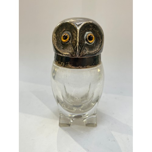 7337 - A William Hutton & Sons Ltd silver lidded vessel, the lid as an owl's head, glass amber bead eyes, L... 