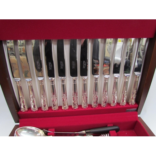 7506 - A canteen of silver plated cutlery, Cooper Brothers, set in a mahogany finish single drawer canteen ... 