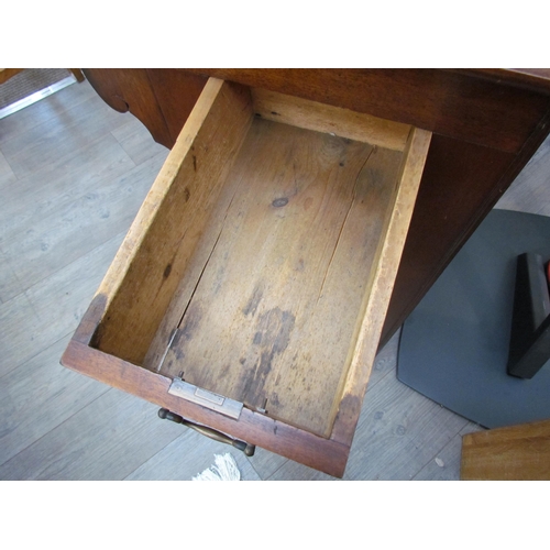 7510 - A circa 1900 shipping clerk’s desk, spindle gallery back, green tooled leather sloped surface with l... 