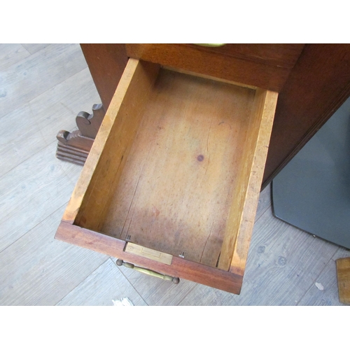 7510 - A circa 1900 shipping clerk’s desk, spindle gallery back, green tooled leather sloped surface with l... 