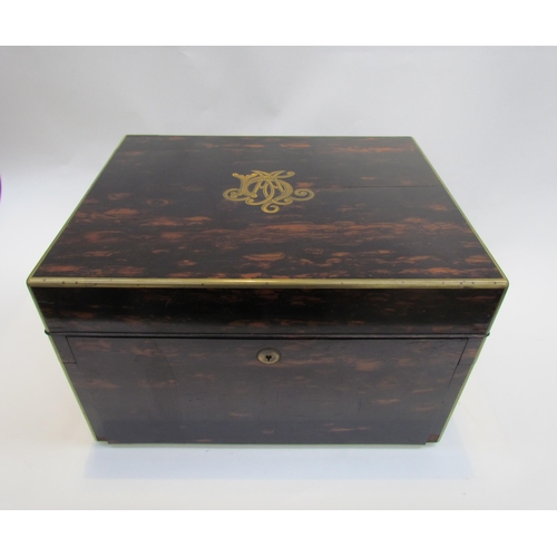 7649 - A 19th Century coromandel travelling vanity box fitted with silver lidded cut crystal glass containe... 