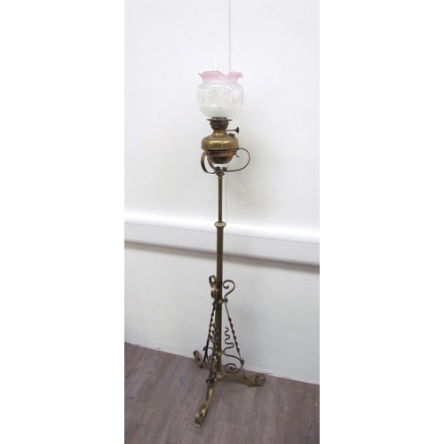 7653 - A Victorian brass extendable height standard oil lamp with copper decoration   (R) £60