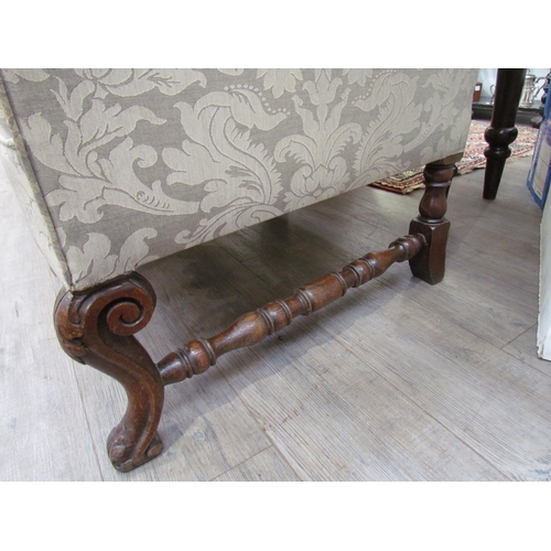 7654 - A Georgian style triple hump back sofa, oak frame, foliate design upholstery